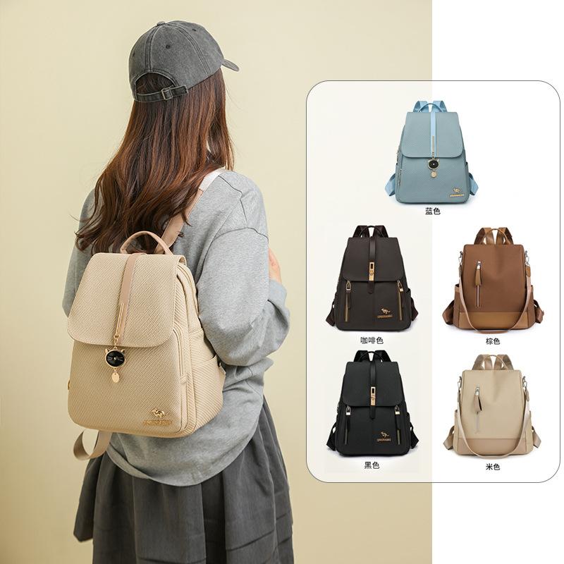 Schoolbag backpack women pu fabric texture commuting large capacity waterproof travel anti-theft backpack niche retro Baigou bag