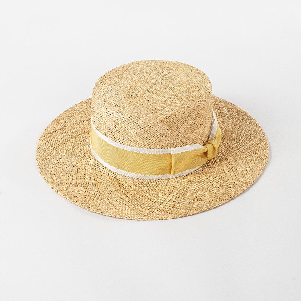 Spring and summer new fashion two-color webbing bow treasure grass wide brim flat top hat outdoor shopping sun protection straw hat