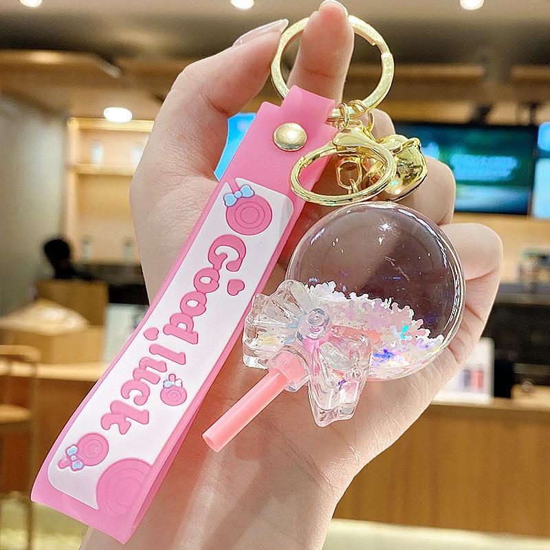 Klíčenka s ozdobou ve tvaru lízátka se sněhovými vločkami a tekutým pískem pro ženy a dívky