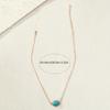 A golden yellow chain peacock blue explosion pattern stone pendant necklace collarbone chain fashionable and elegant vacation style