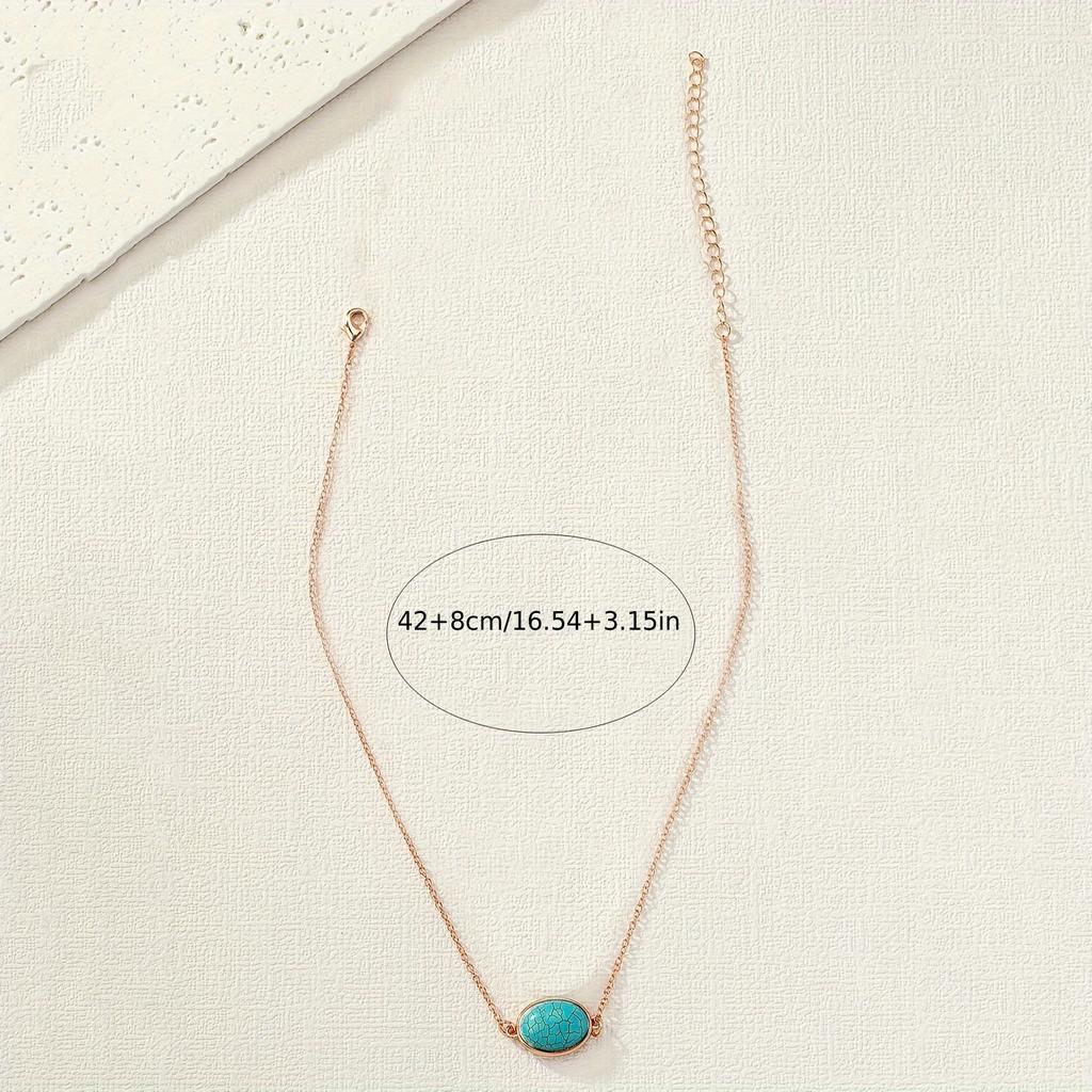 A golden yellow chain peacock blue explosion pattern stone pendant necklace collarbone chain fashionable and elegant vacation style