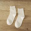5/10 Paires Chaussettes Décontractées Confortables Printemps Été Femmes Mi-mollet Couleur Unie Coton Chaussettes Longues Mignonnes Absorbant la Transpiration Respirantes