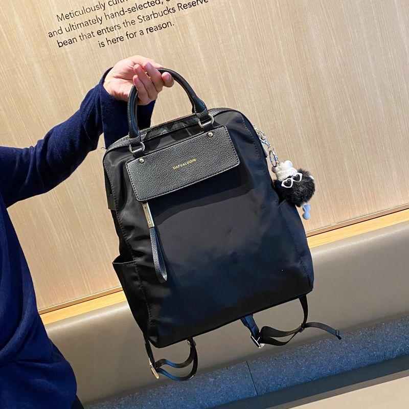 

Рюкзак-кенгуру двойного назначения, портативный, из ткани Оксфорд, легкая сумка для женщин 2025, максимально простой для сочетания, минималистичный корейский рюкзак, большая вместимость Black(Complimentary Stuffed pendant)