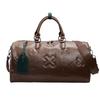 Fashionable PU Embossed Women's Handheld Travel Bag - Large Capacity Carry-on with Wet/Dry Separation for Business and Fitness.