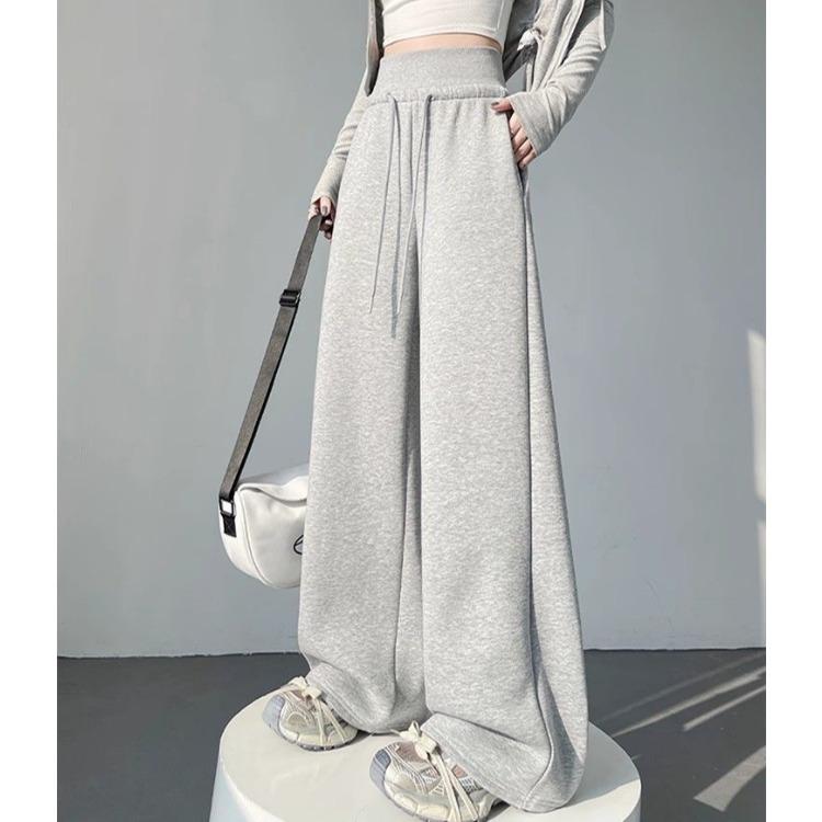 Wygodne i stylowe szare spodnie damskie w amerykańskim stylu ze sznurkiem i szerokimi nogawkami, idealne do noszenia na co dzień i do uprawiania sportu