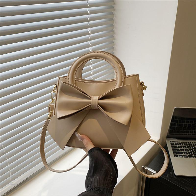 

Premium autumn women s new bow, high-end fashion single shoulder portable women s oblique span bag хаки