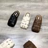 Retro woven bag head half slippers women's wear 2025 spring and summer new square head lazy shoes Internet celebrity flat muller shoes