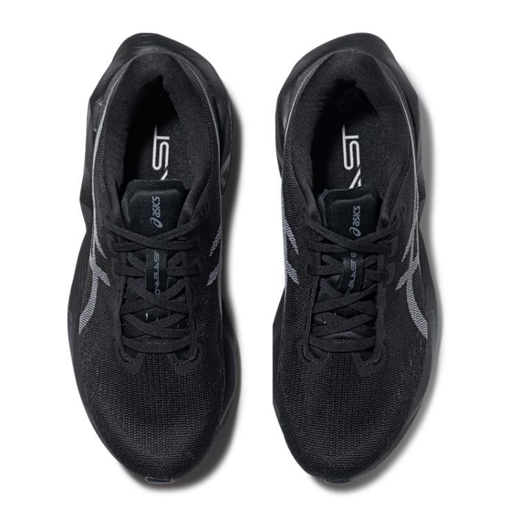 Asics Novablast 6 Szerokie Wygodne Oddychające Responsywne Buty do Biegania Męskie sneakers Czarny Biały 1011C242-002