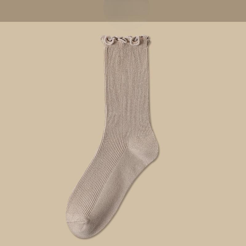 

Высокие хлопковые носки однотонных цветов универсальны в тренде женских осенне-зимних носков с отделкой «черный грибок» и махровой подошвой. 1 pair бежевый