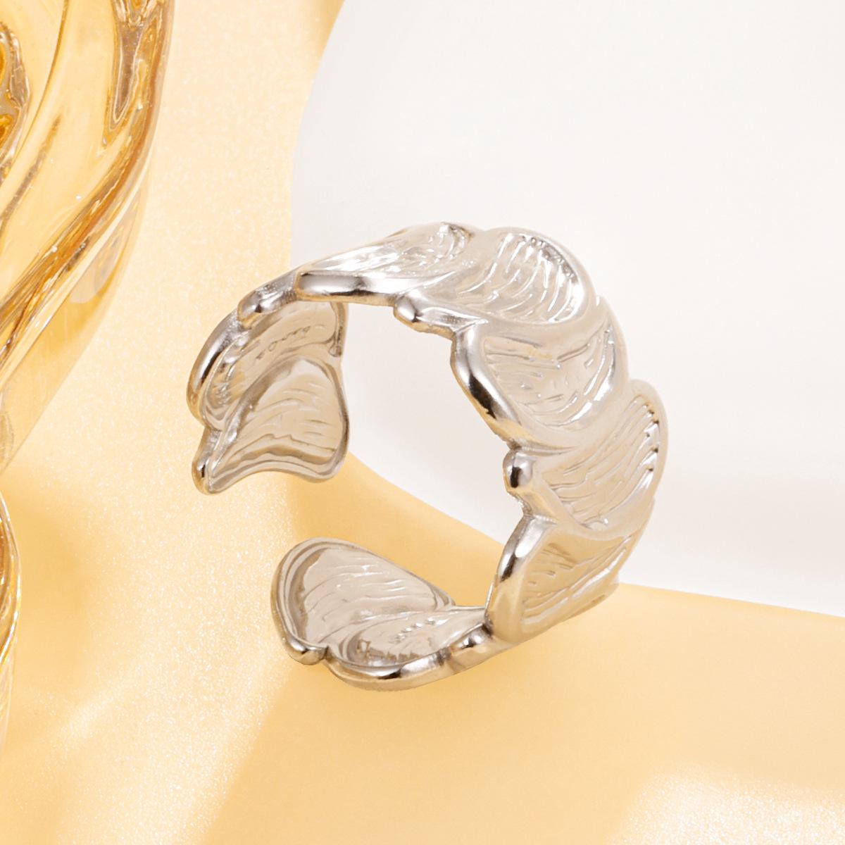 Stainless Steel Jewelry: Personalized Irregular Geometric Water Drop Wide Band Ring with Unique Texture.
