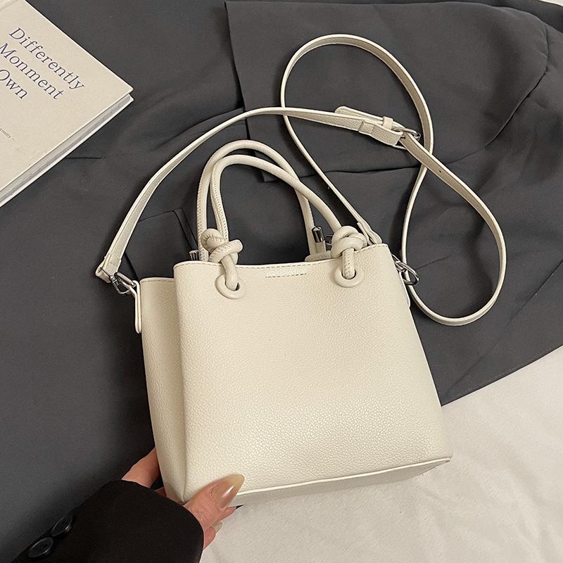 2025 New Simple Solid Color High-end Portable Bucket Bag Spring and Summer New Versatile Casual Commuter Messenger Bag
