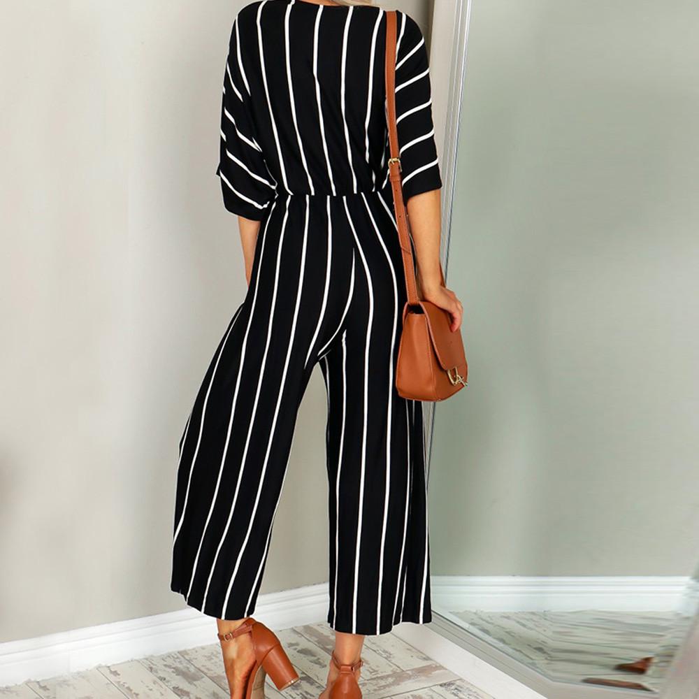 Madingas moteriškas kombinezonas su V formos iškirpte trijų ketvirčių rankovėmis dryžuotas laisvas kombinezonas