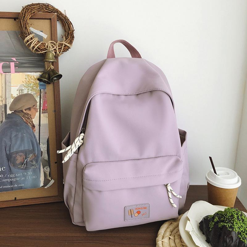 New casual simple solid color backpack large capacity junior high school student schoolbag