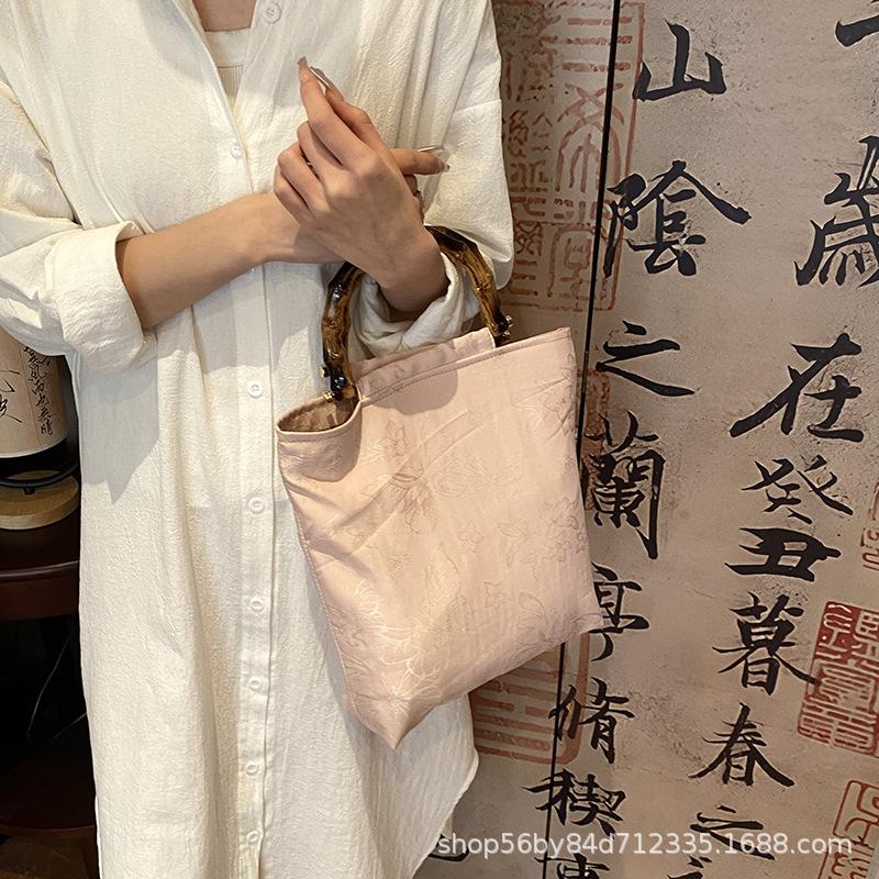 High-end Niche Bag Women's 2025 Spring and Summer New Xiaoxiangfeng Wooden Handle Portable Bucket Bag