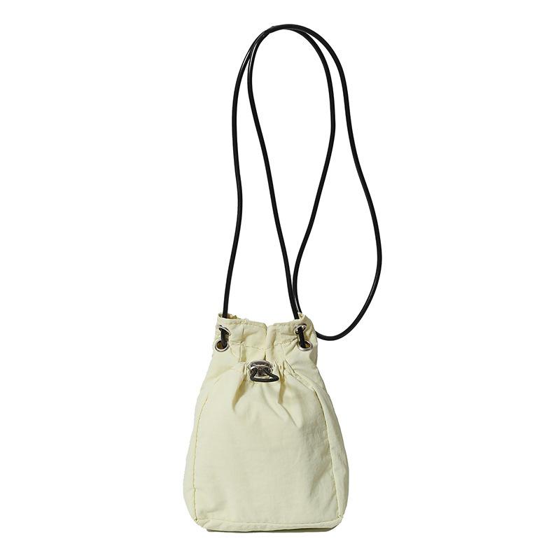 Minimalist style Japan and South Korea light drawstring canvas trend 2025 personalized solid color shoulder crossbody change mobile phone bag women's