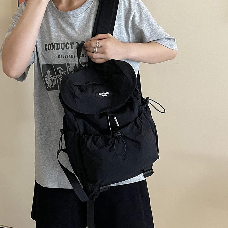 Schoolbag's new large-capacity backpack is simple and lightweight, contrasting color backpack, drawstring, men's and women's schoolbags