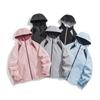 Lovers' storm jacket men and women's new autumn fashion brand waterproof windproof jacket loose hooded coat