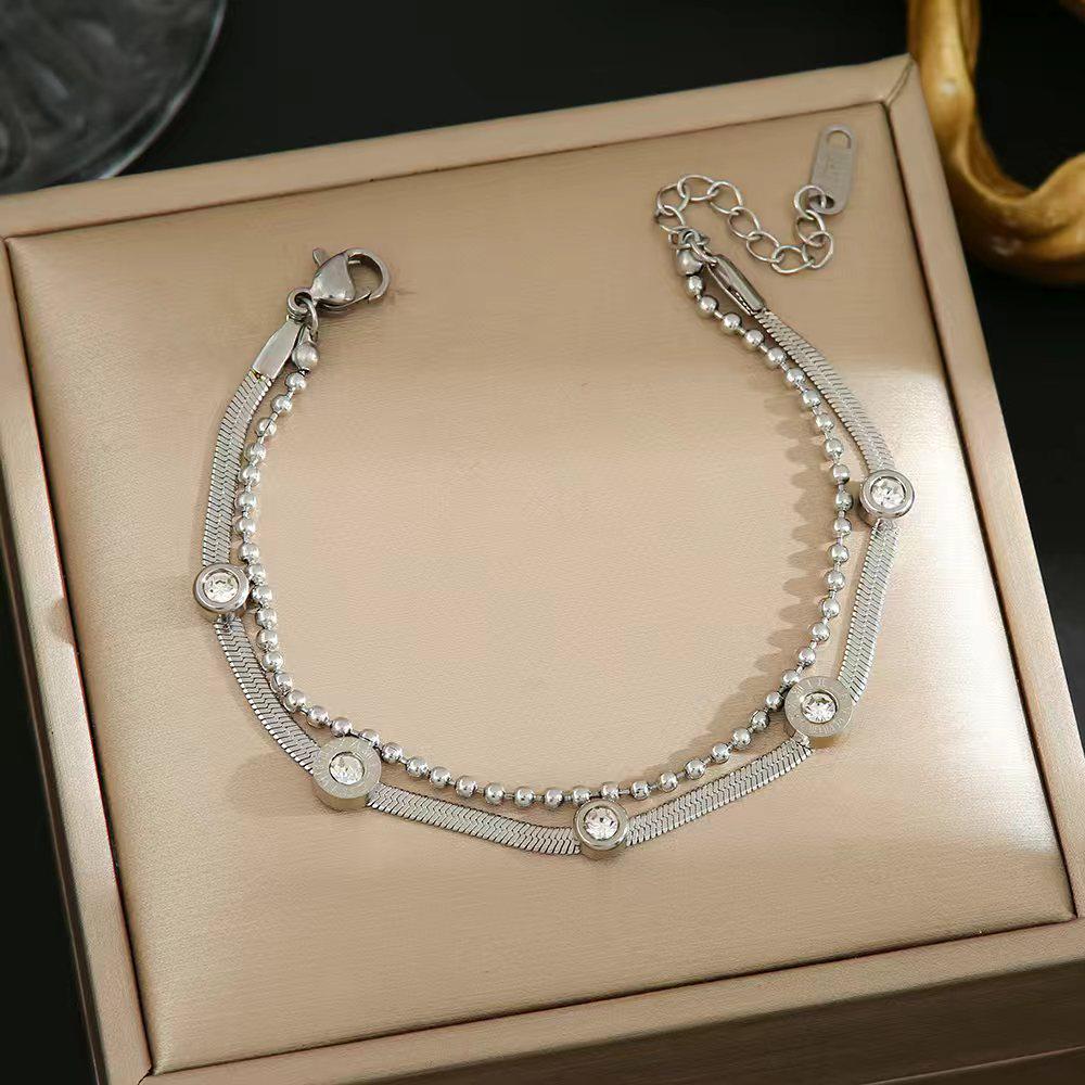 Luxe Titanium Staal Vierbladig Klaver Armband in Koreaanse Stijl met Ingelegde Diamanten voor Vrouwen - Kleurvast