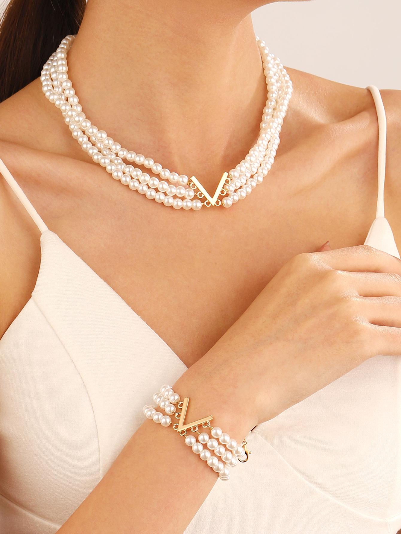 

Жіночий ювелірний набір високого класу в європейському та американському стилі: Двошаровий перловий чокер, намисто на ключицю, браслет та сережки