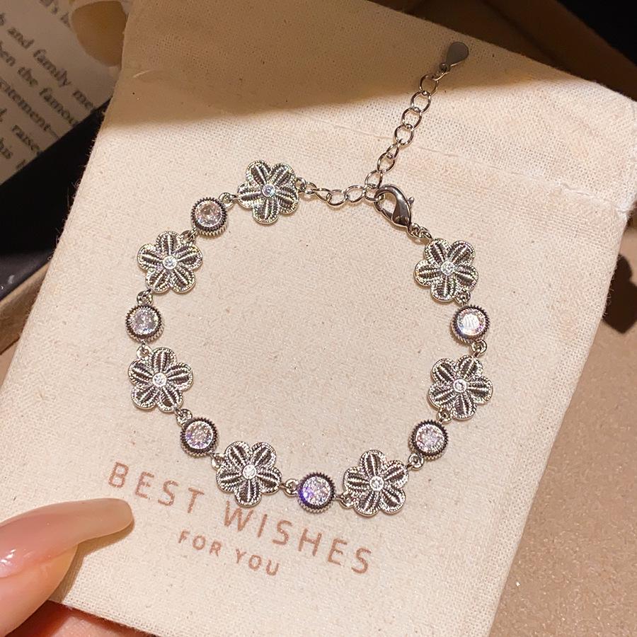 Korean Style Zircon Flower Bracelet: Silver Star Adornment, Simple & Elegant Design, Light Luxury Women's Hand Jewelry