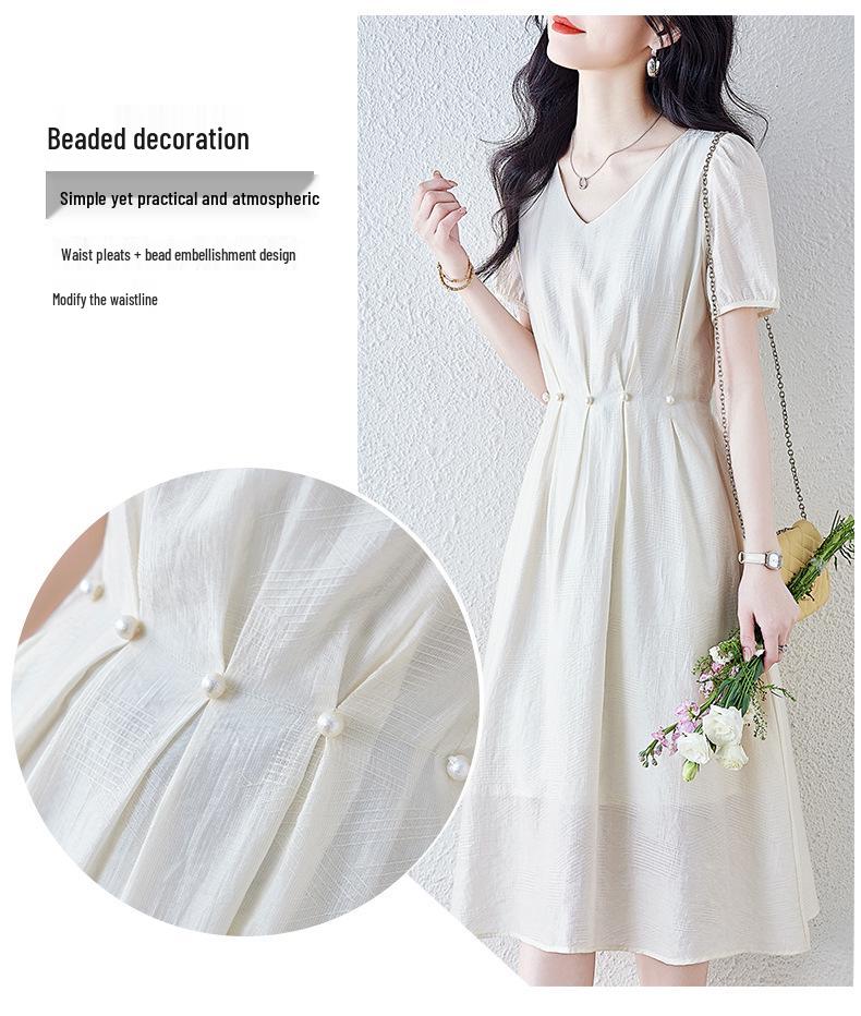 Elegant French-Style Summer Dress: Cinched Waist, Age-Defying Design