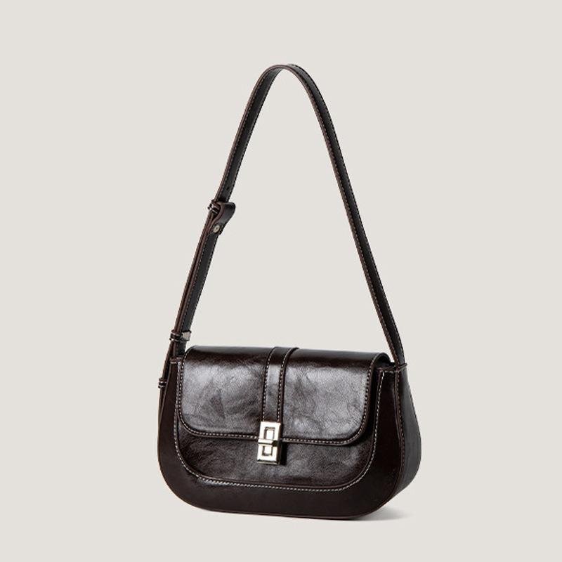 Niche design high-end clamshell shoulder armpit bag women's fashion commuting versatile