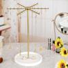Decorative Gold Metal Jewelry Stand 48 Hooks 360° Rotation Design Large Capacity Necklace Bracelet Organizers Compact Display