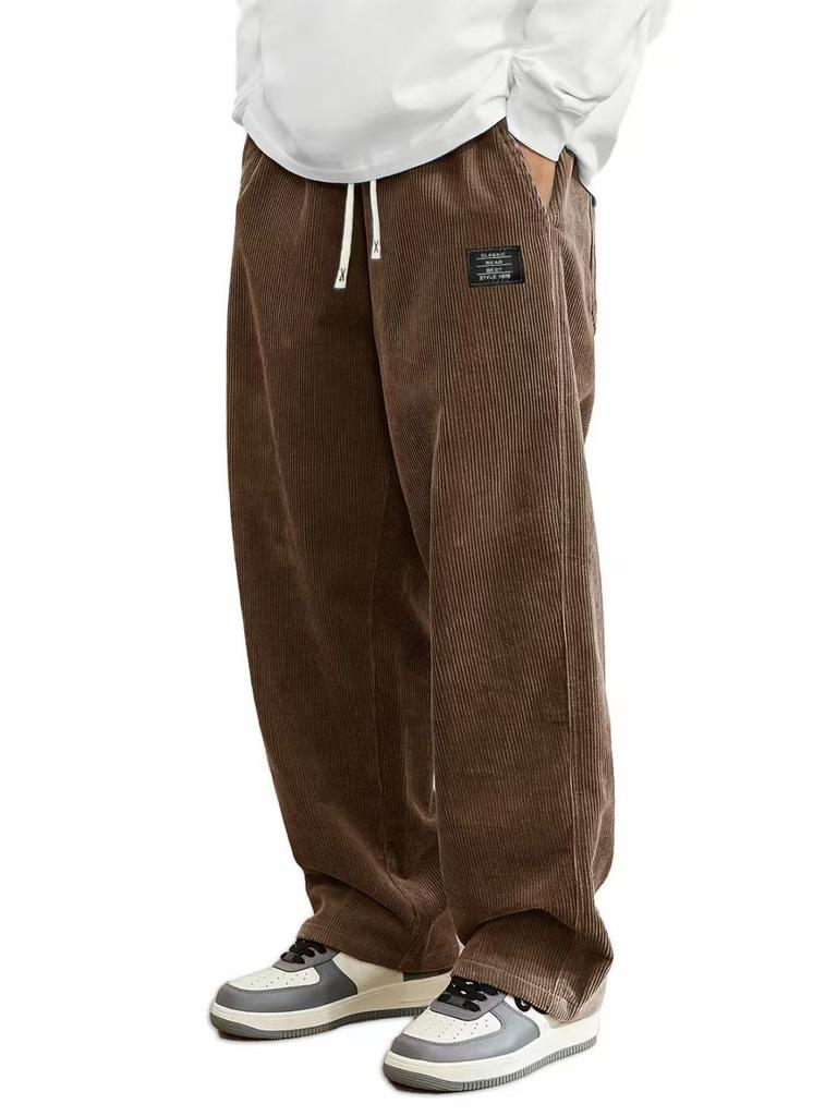 Pantaloni da uomo in velluto a coste a gamba dritta con coulisse in vita, tasche e logo, elasticizzati, vestibilità casual per l'uso quotidiano