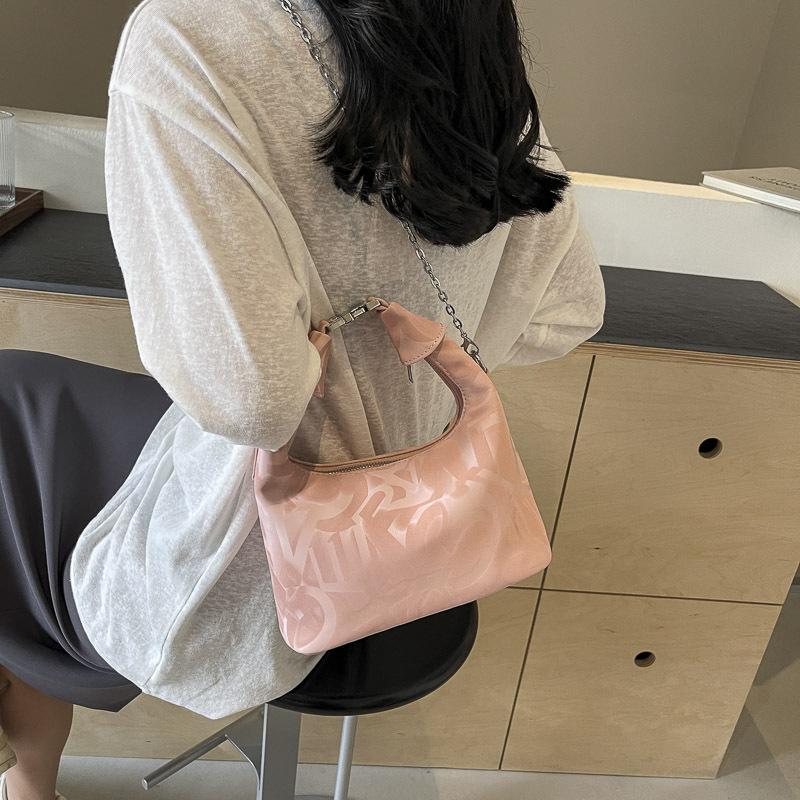 

Закордонна односумкова жіноча 2024 нова трендова осінньо-зимова мода універсальна одноплечова кросбоді сумка-пельмень для виходу на роботу маленька сумка рожевий