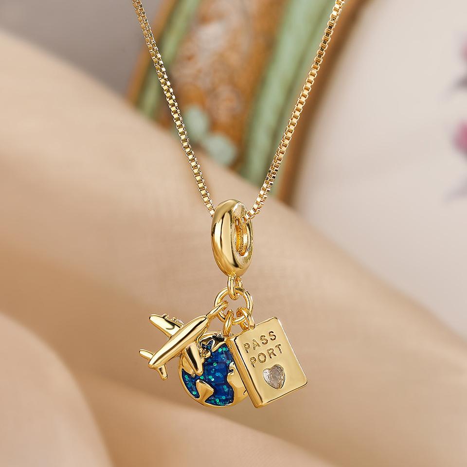 ZAKOL Gold Color Titanium Steel Chain Necklace Fashion Planet Astronaut Round Pendant Necklace Party Zircon Gift