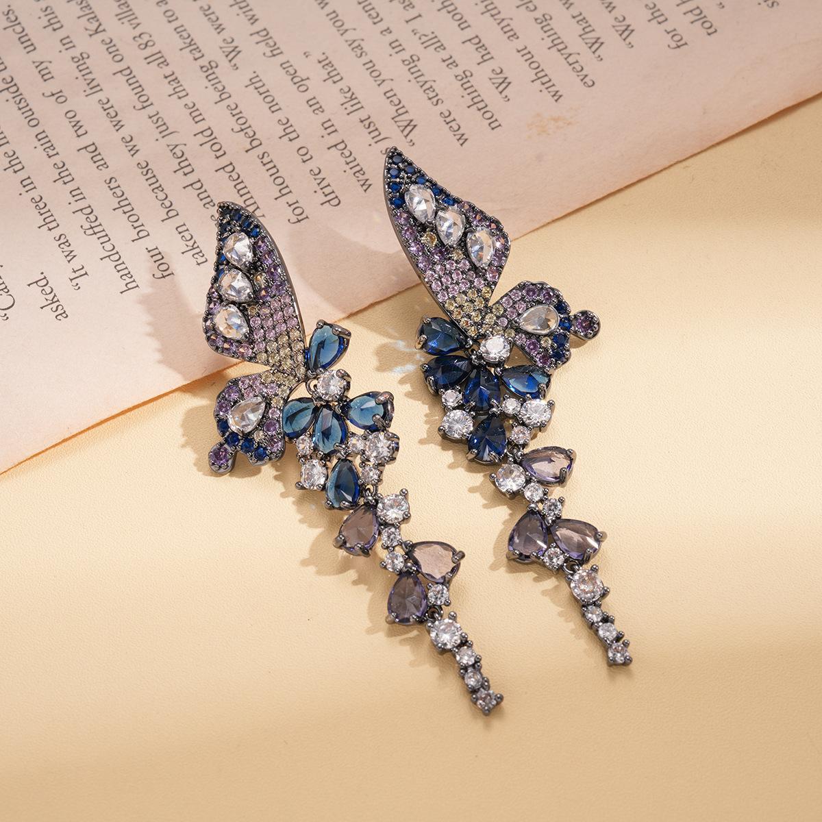 Европейские и американские циркониевые крылья цветок капля воды бахрома серебряная игла серьги средневековые легкая роскошь нишевые серьги