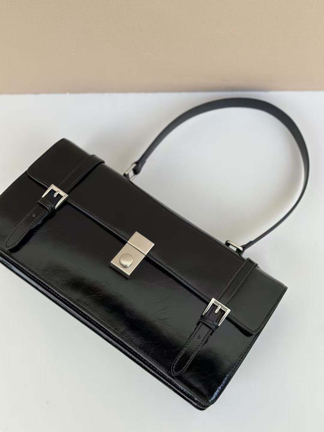 

Найди новую высококачественную кожаную сумку-мессенджер через плечо, нишевую ретро-сумку-багет для женщин 33*9*17 чёрный