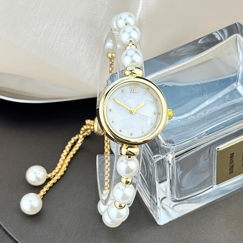 

1pc Elegant Adjustable Pull-Out Alloy Strap with Imitation Pearl ,Comfortable Round Alloy Case Quartz Wrist Watch for Women золотий