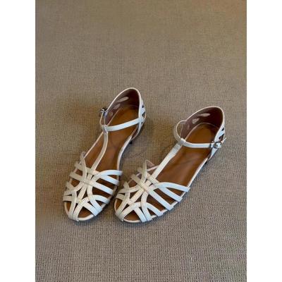 Gewebte Retro-Hohl-Atmungsaktive Sandalen Damen 2025 Sommer Neue Flachboden-Freizeit-Vielseitige Ein-Wort-Schnallenriemen Römerschuhe