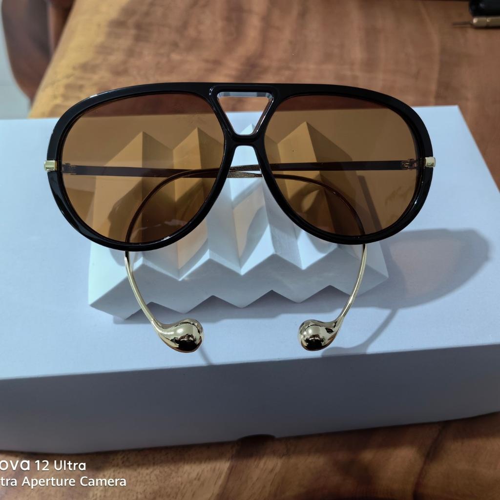 Internet celebrity new pendant sunglasses men's European and American fashion oval sunglasses ultra-light driving toad glasses