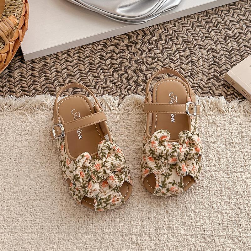 

Girls floral sandals2026Summer New Floral Leopard Print Bow Hollow Princess Sandals 27-31Code one hand5Double бежевий