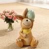 The retro brown rabbit statue decoration ornament with eggs is suitable for Easter home garden desktop decoration.
