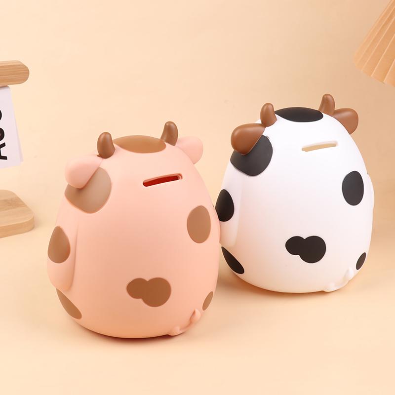 Niedliches Cartoon Kuh Sparschwein Kreatives Vinyl Sparschwein Kinder Geldsparspielzeug Münzbanken Desktop-Ornamente Kindergeschenke