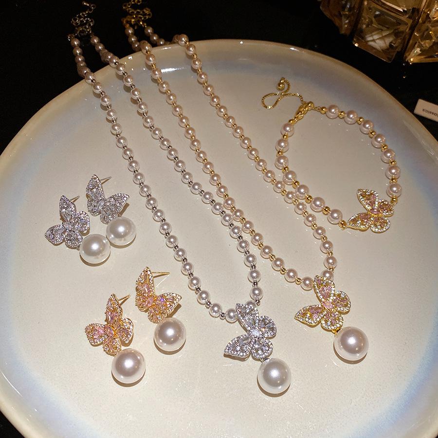 Butterfly Shimmer 18k Gold Zircon Pearl Jewelry Set for Women: Earring, Necklace, Bracelet.