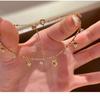 Elegant French Retro Heart Tassel Diamond Pendant Bracelet - High-End Fashion for Women.