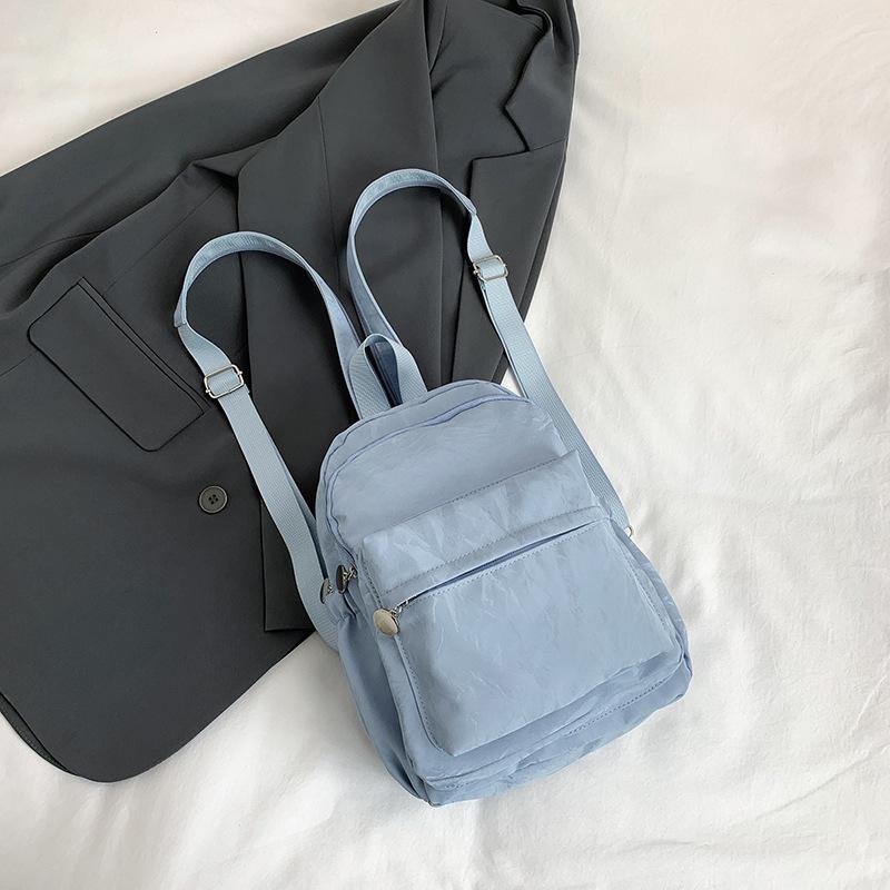 Tooxika Новый однотонный парный простой маленький рюкзак для путешествий и отдыха синий 3889₽