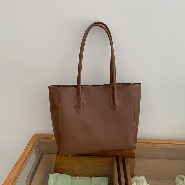 

Bag Women s 2025 New Portable Large Bag Tote Bag Niche Design Versatile Large Capacity Shoulder Casual Underarm Bag