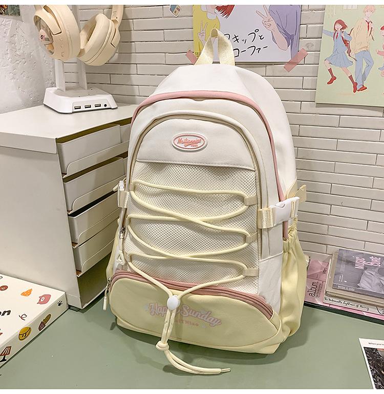 High-value cute primary school student spine care schoolbag female junior high school girl high school student backpack burden reduction