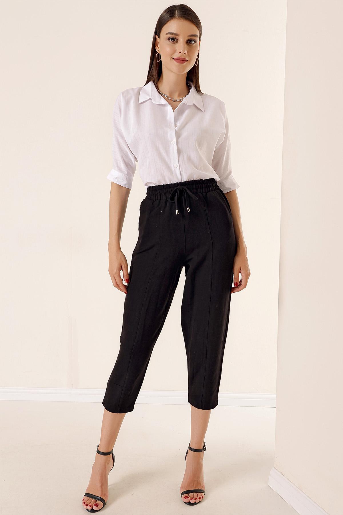 

Льняные брюки-баллоны с поясом и карманами на талии XL чёрный