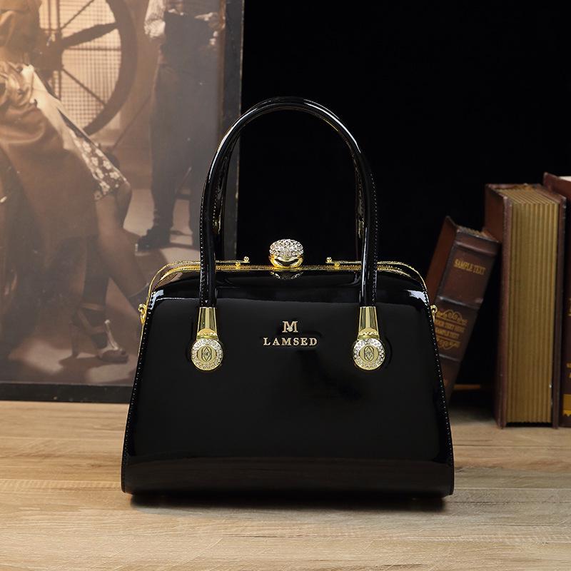 

Шикарная женская сумочка 2025: Универсальная сумка на плечо, через плечо и тоут для стильных мам чёрный