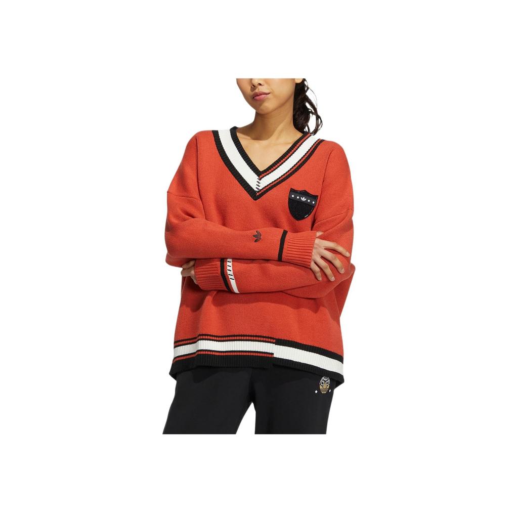 adidas Originálny pletený vianočný sveter s výstrihom do V a vyšívaným logom pre ženy, oranžový HS9520