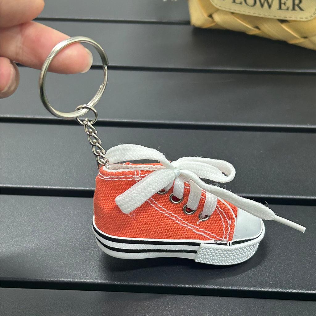 Mini canvas small shoes fashion bicycle motorcycle foot support small board shoes pendant simulation shoe keychain