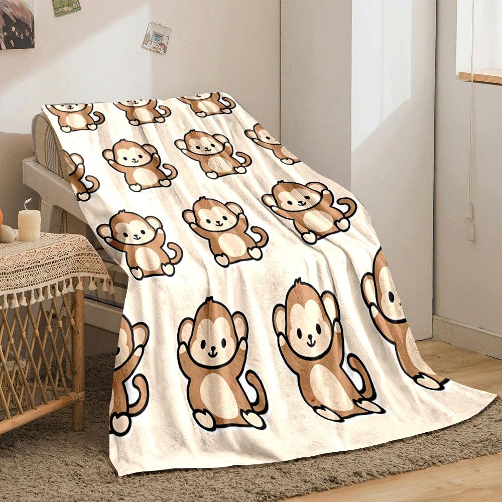 Cartoon monkeys with raised arms repeated on a beige background. for all seasons blanket lunch break throw gift
