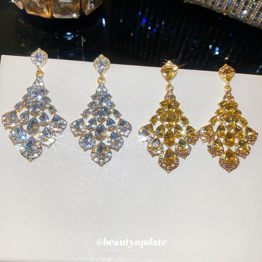 Silver Needle Super Flash Diamond-set Hollow Water Drop Geometric Stud Earrings, Light Luxury Niche High-end Earrings for Women