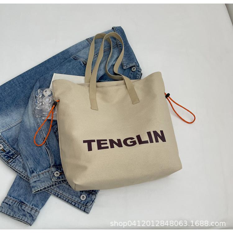 

Large capacity casual canvas bag 2025 new trendy fashion versatile shoulder bag student class commute tote bag хаки